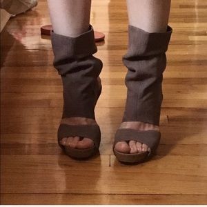 Leather peep toe bootie heels.